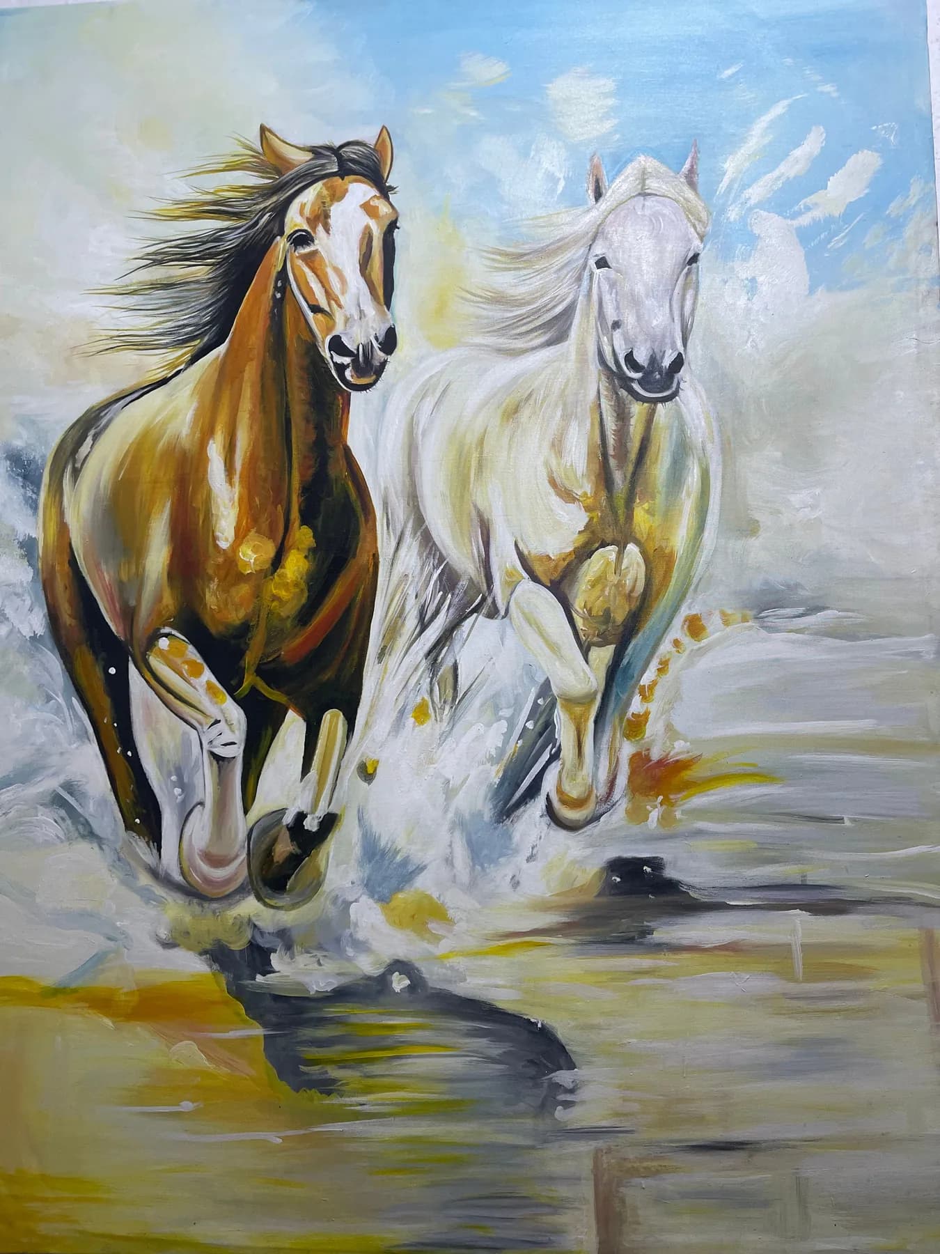 Painting of two horses running through water